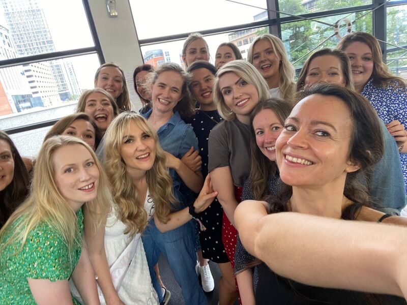 Hen party dance class in Bristol city centre - group of women dancing and laughing